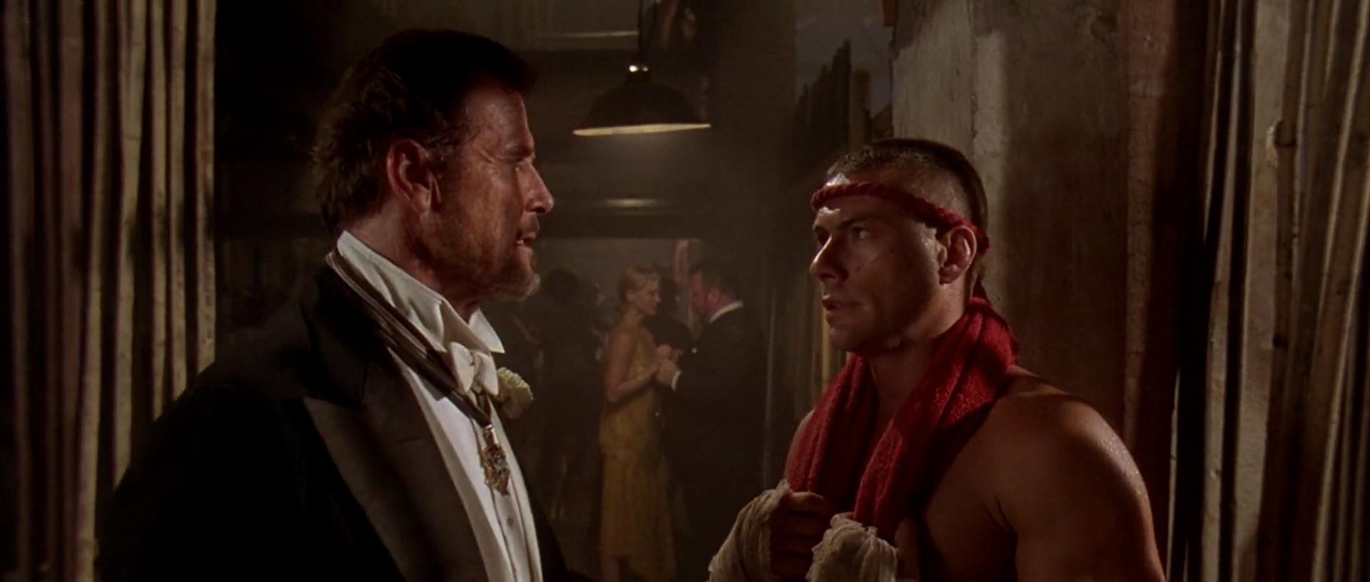 Roger Moore and Jean-Claude van Damme in The Quest