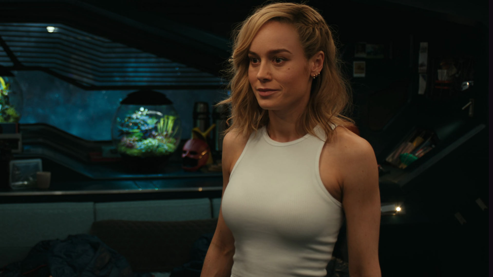 Brie Larson in a tight white tanktop in The Marvels