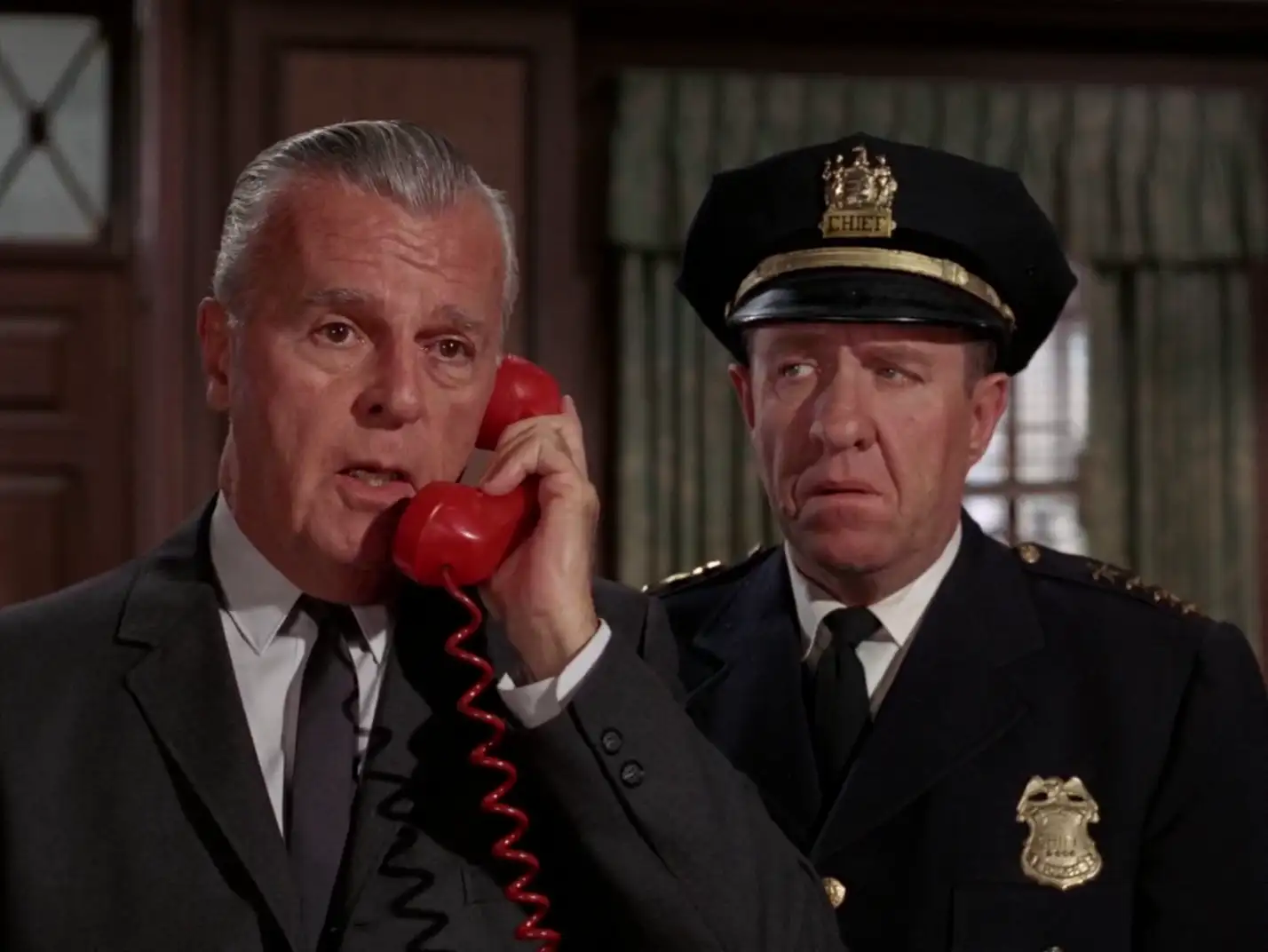Neil Hamilton and Stafford Repp as Commissioner Gordon and Chief O'Hara in Batman