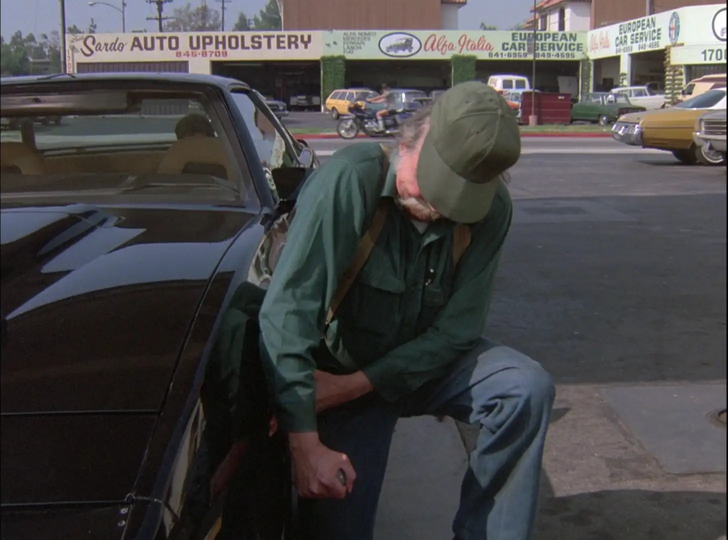 A gas station owener trying to puncture KITT's tire in Knight Rider: No Big Thing