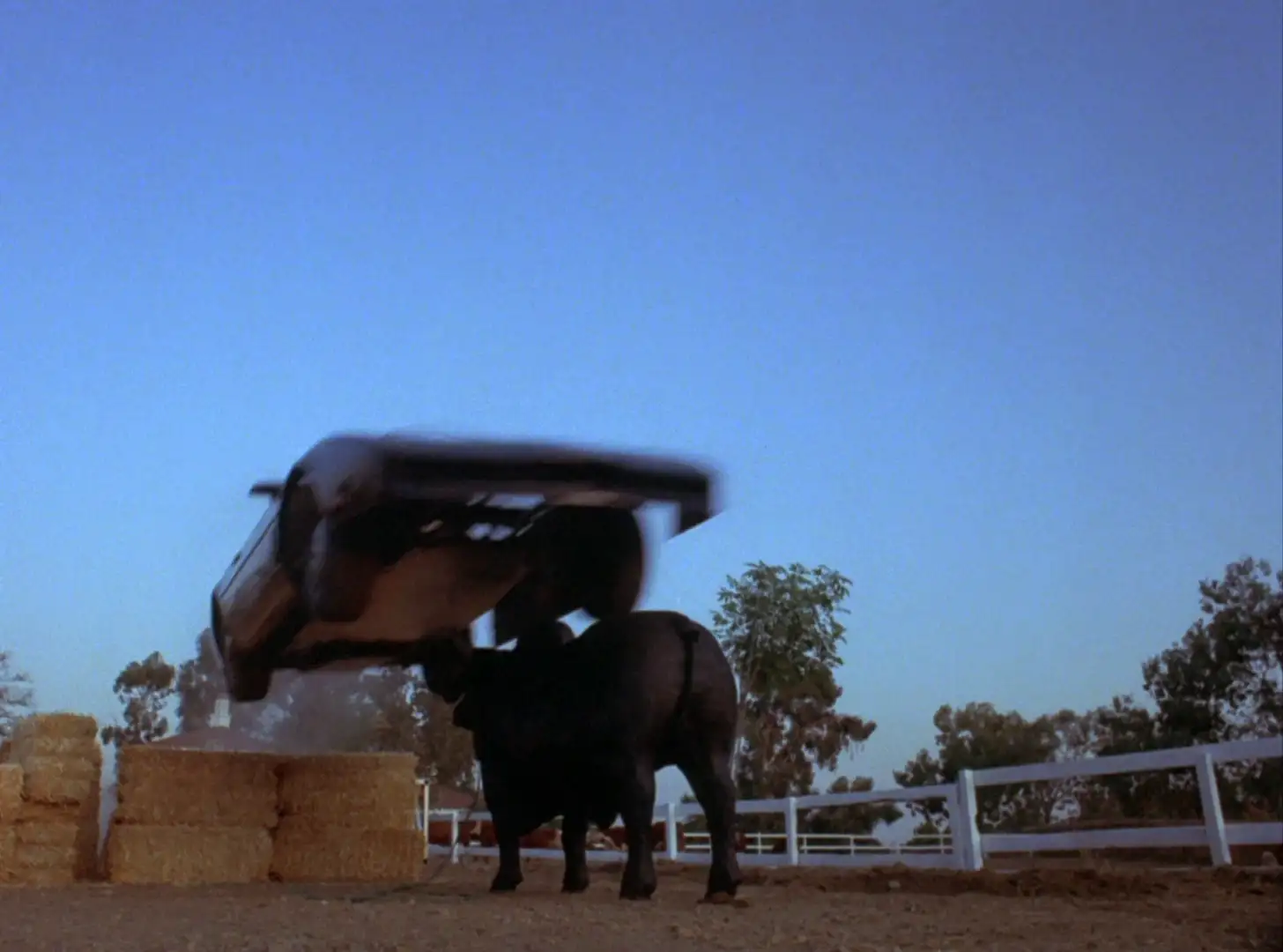 A fake KITT jumping over a fake Bull in Knight Rider: Not a Drop to Drink