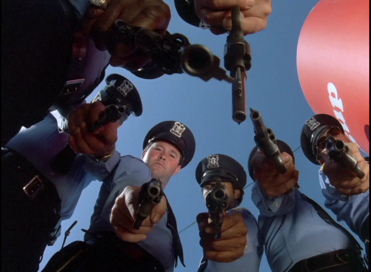 A bunch of cops pointing their guns at the camera in Knight Rider: Trust Doesn't Rust