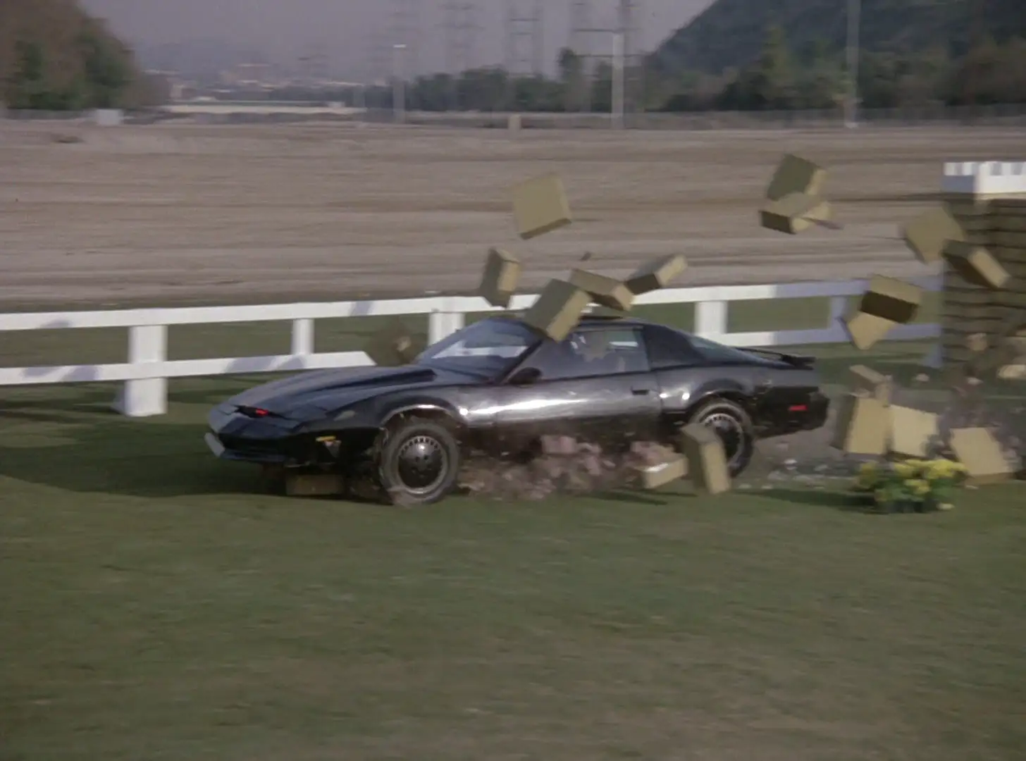 KITT breaking though a horse fence Knight Rider: Forget me not